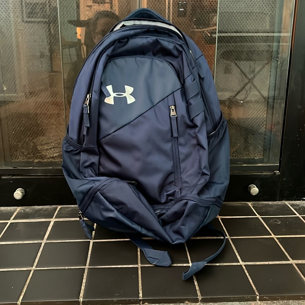 Gently used, navy blue, Under Armour backpack, zipper on bottom for shoes